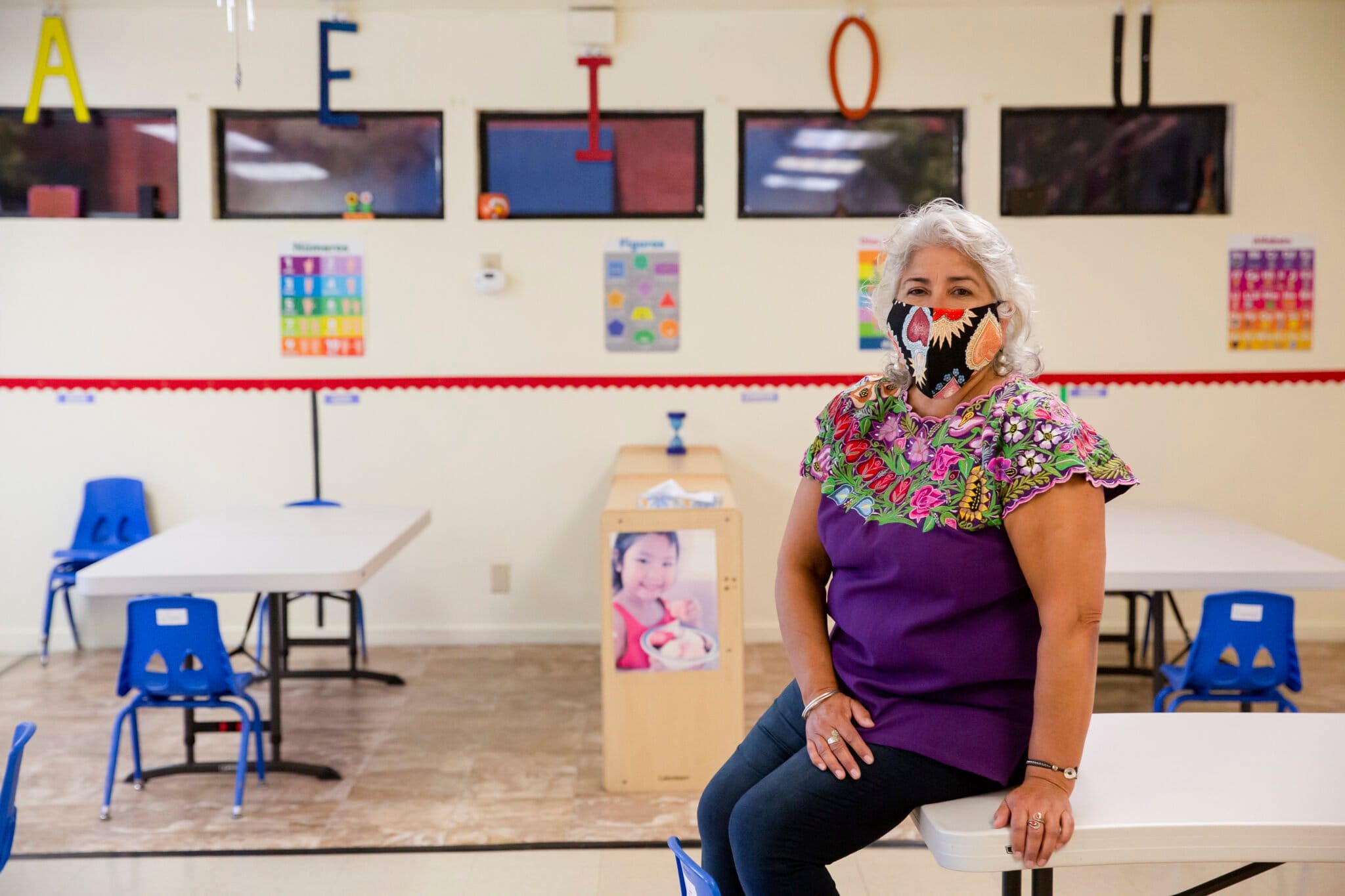 Beatriz Leyva-Cutler, executive director for BAHIA Inc. sits for a portrait in an empty classroom at Centro Vida Child Care Center, a part of the Bay Area Hispano Institute for Advancement